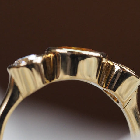 Yellow sapphire and diamond ring in 18ct yellow gold
