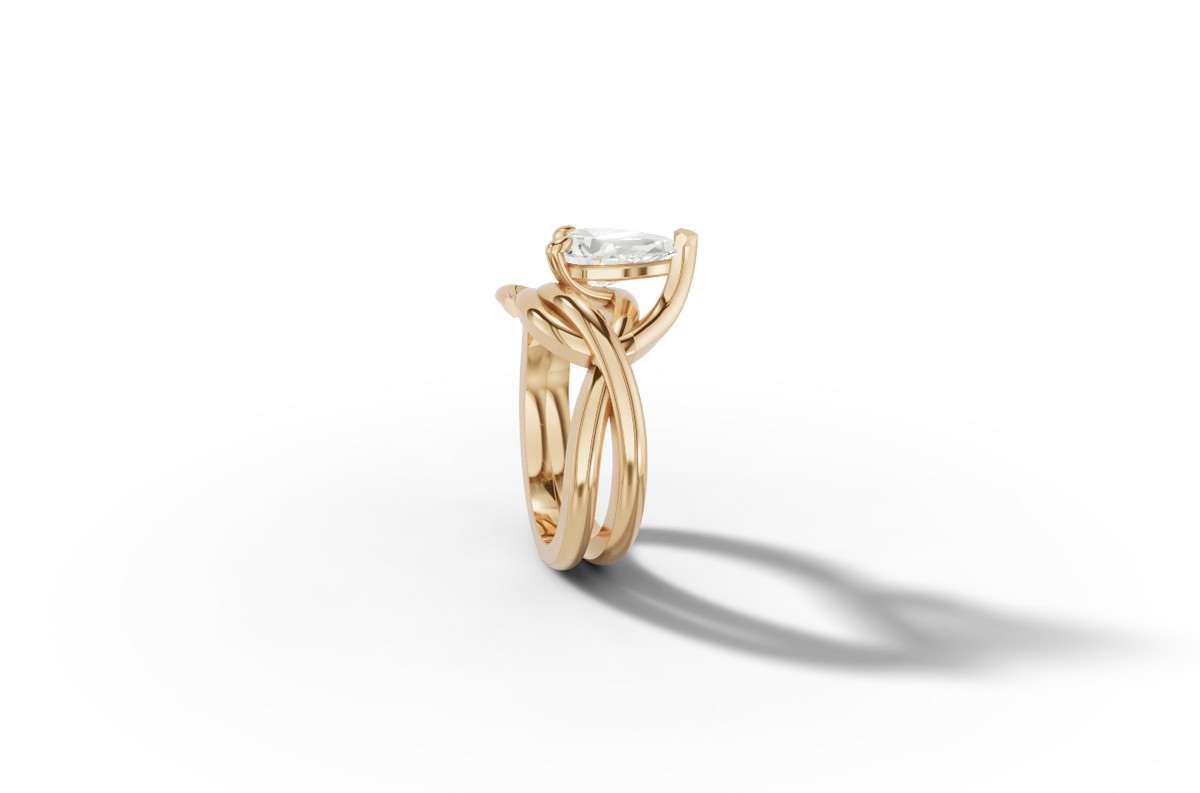 Fluere pear cut engagement ring