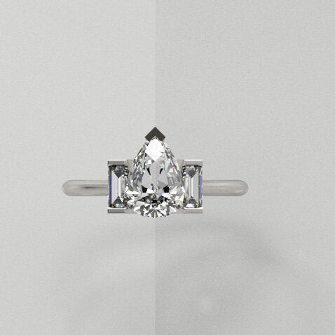 Pear and baguette ring