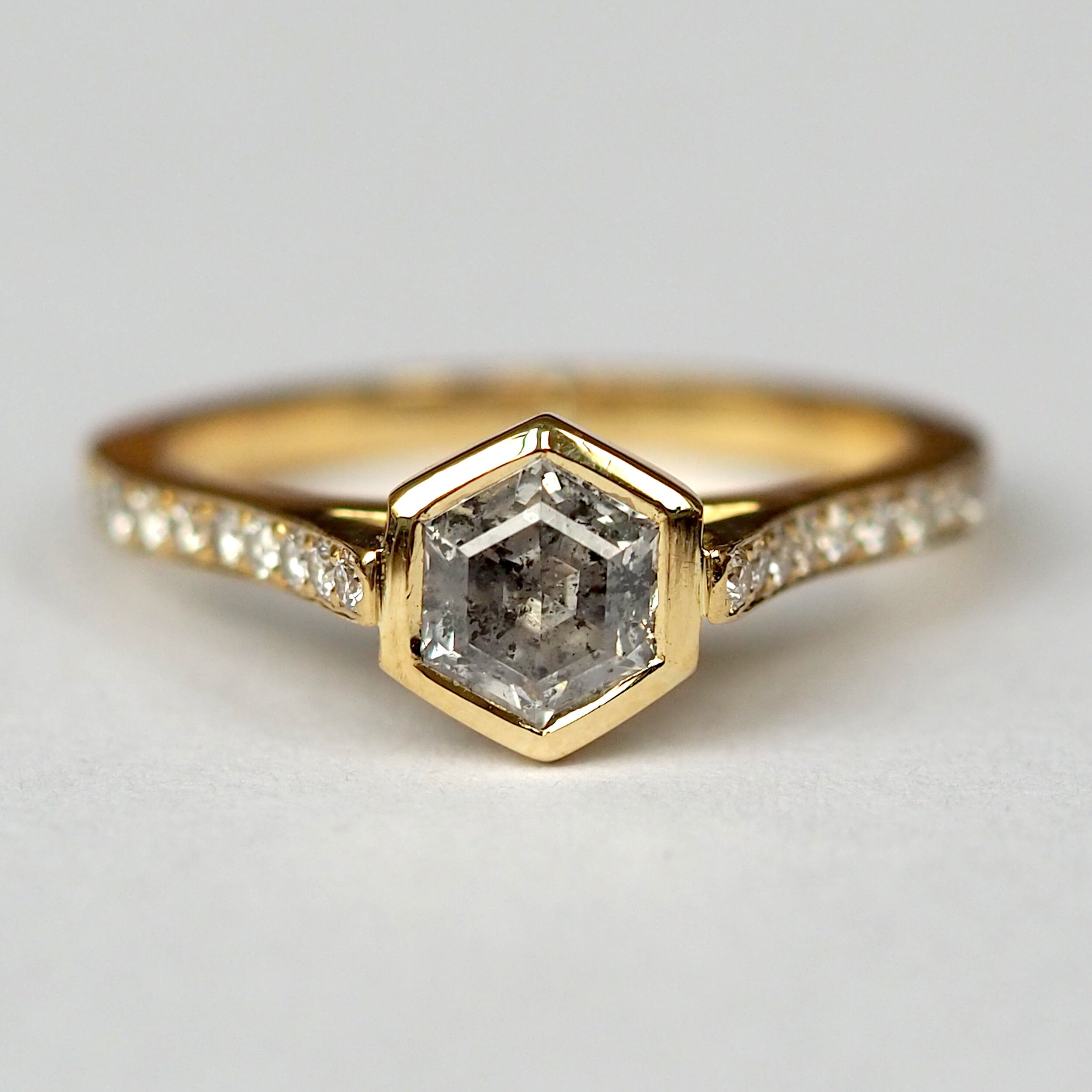 Salt and pepper hexagon diamond ring in yellow gold