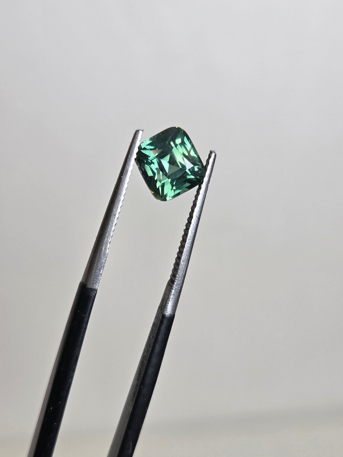 2.05ct Cushion cut green/teal sapphire