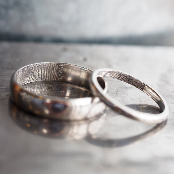platinum wedding rings with laser engraved finger prints