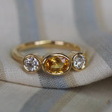 Yellow sapphire and diamond ring in 18ct yellow gold