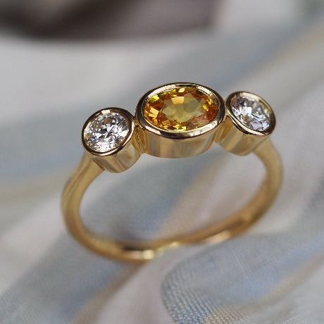 Yellow sapphire and diamond ring in 18ct yellow gold