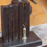 yellow gold poured into mould