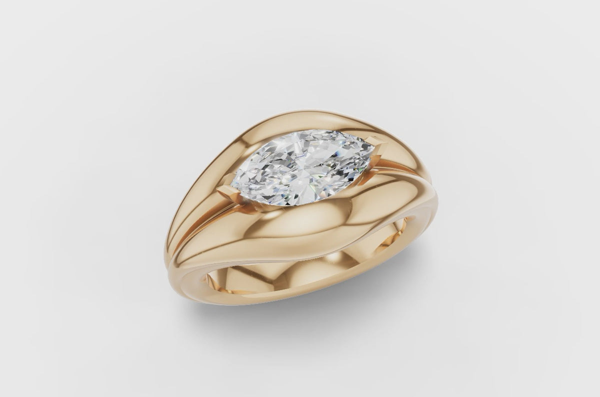 Heavy gold marquise cut diamond ring