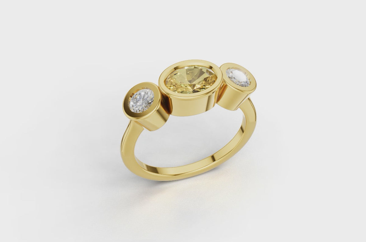 Yellow sapphire and diamond ring in 18ct yellow gold