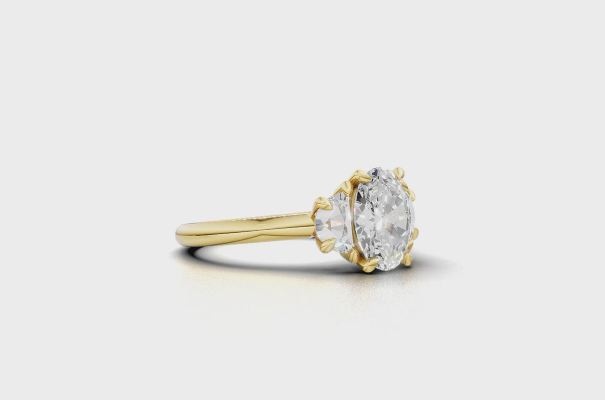 Oval 3 stone engagement ring