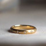 Star set 18ct yellow gold wedding ring