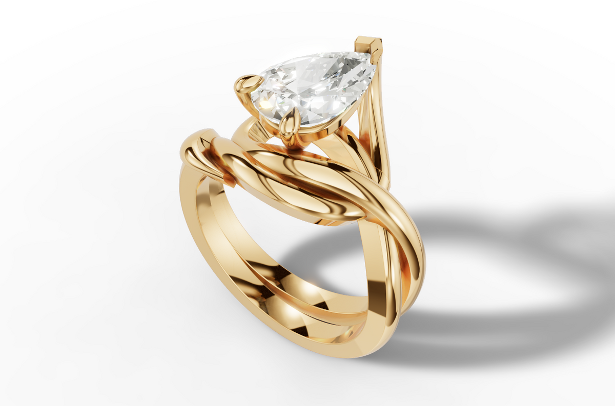 Fluere pear cut engagement ring
