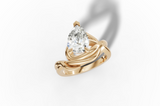 Fluere pear cut engagement ring
