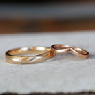 twisted yellow gold and v shaped rose gold  wedding ring