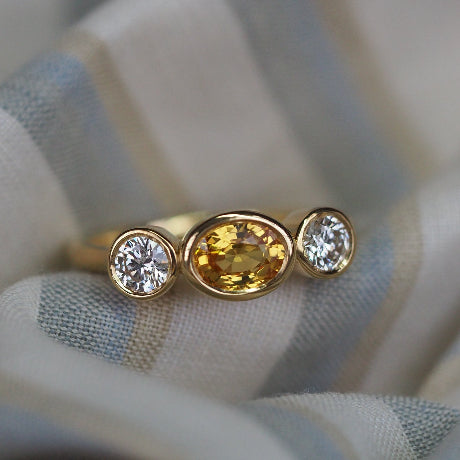 Yellow sapphire and diamond ring in 18ct yellow gold